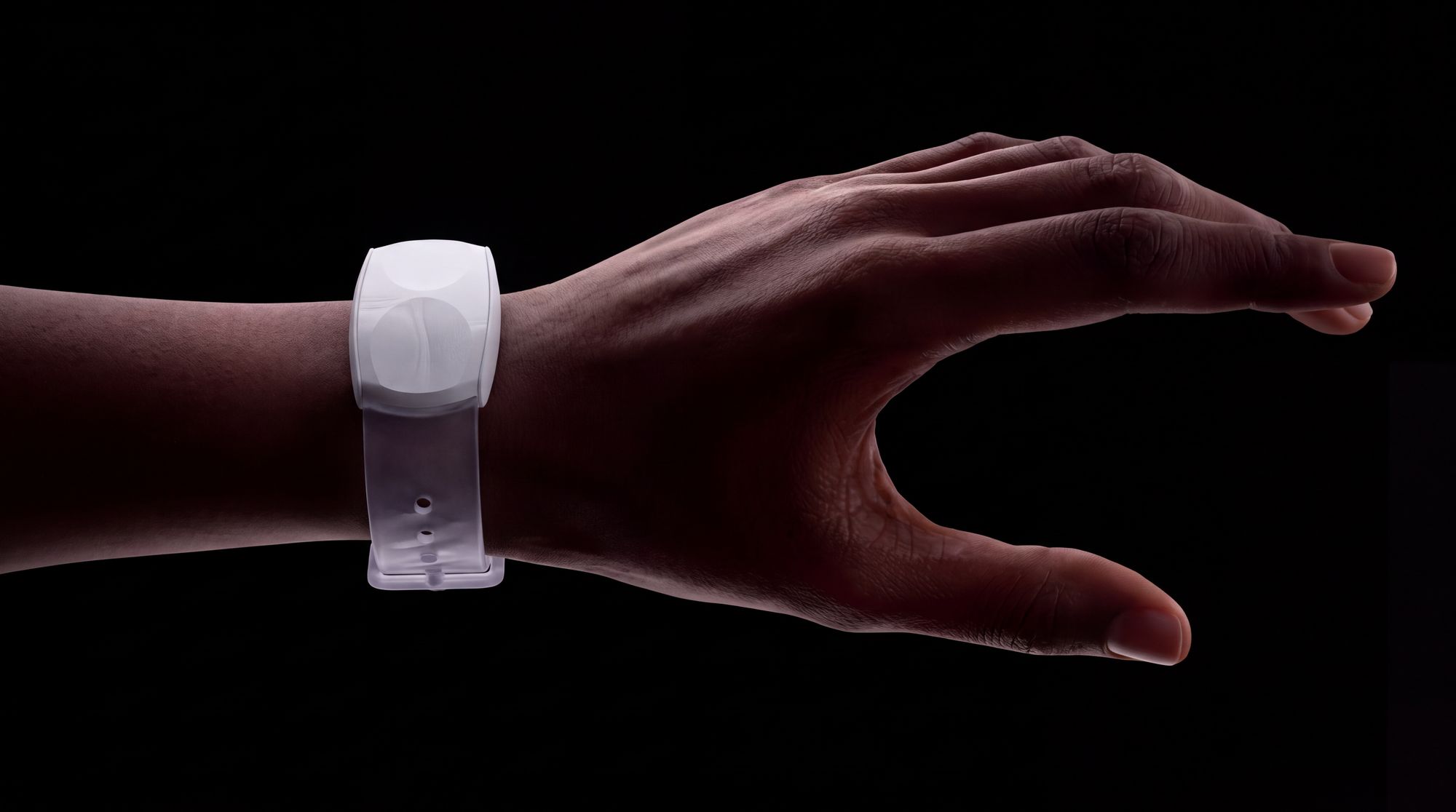 Nocturne bracelet on a wrist, dark background