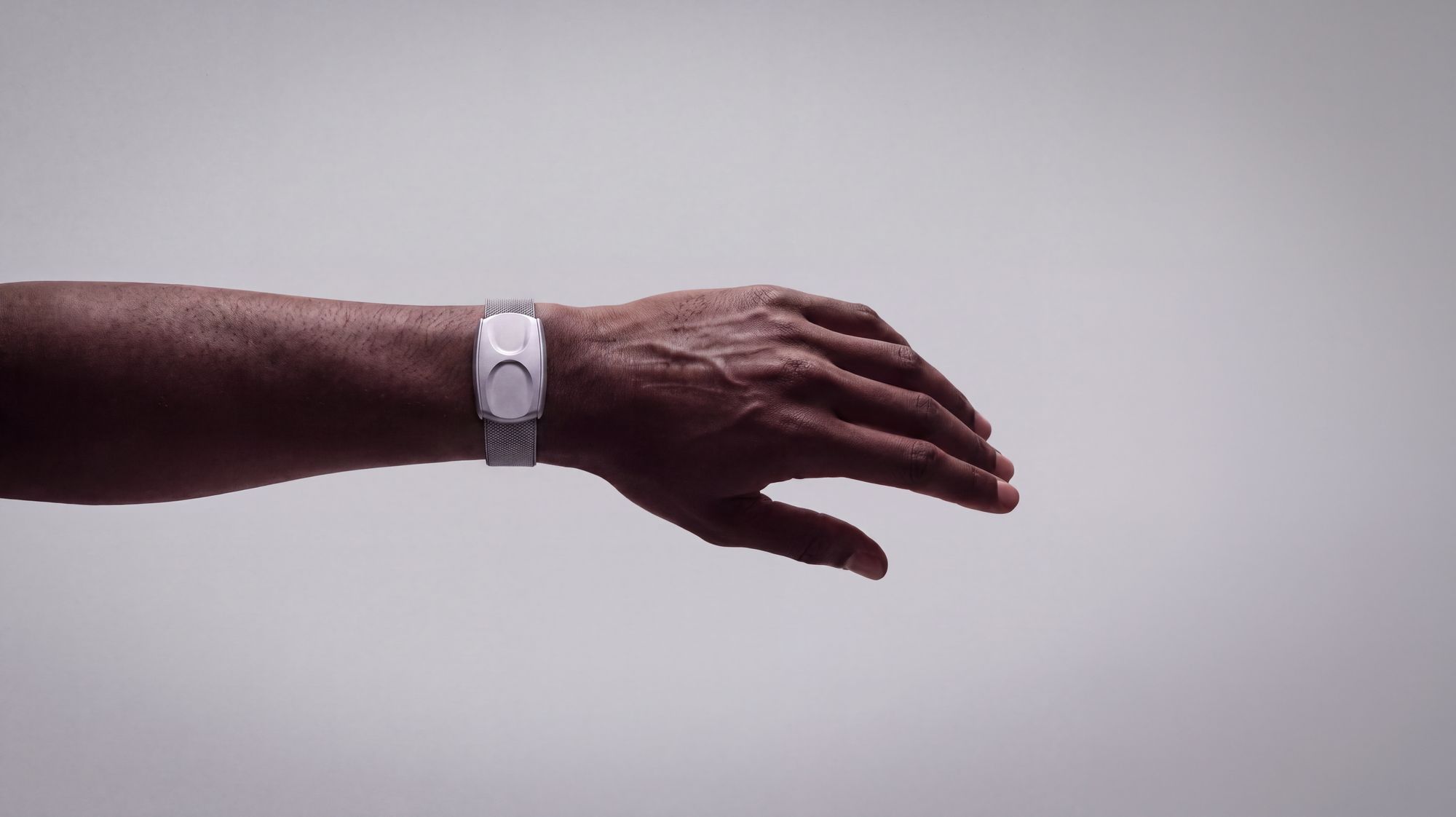 Nocturne bracelet on a wrist, open hand, light background